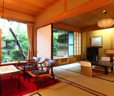 Traditional tatami room with shoji screens and garden view at Yudanaka Yumoto in Nagano, Chūbu Japan