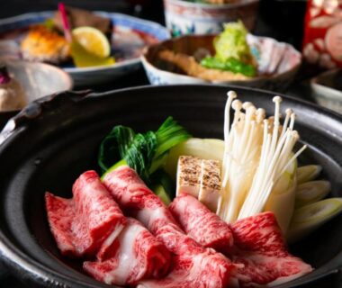 Thinly sliced marbled beef and enoki mushrooms in hot pot at Yufuin Kaze no Mori, Ōita, Kyūshū