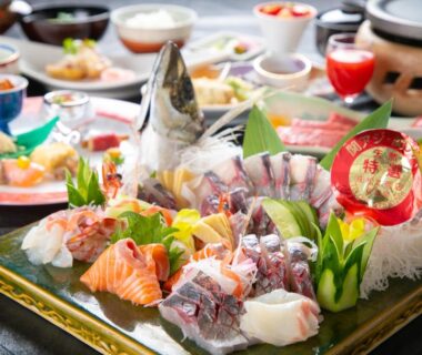 Assorted sashimi platter with garnishes and side dishes at Yufuin Yasuha in Ōita, Kyūshū
