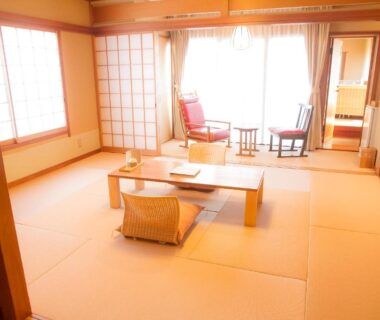 Tatami room with low table, shoji screens and balcony seating at Yugawara Retreat Goen no Mori, Kanagawa