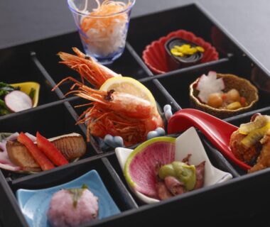 Lacquered multi-compartment box with assorted small Japanese dishes, YuhigauraOnsen Umi no Hana, Kyoto