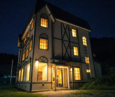 Multi-story ryokan lit at night, YuiLocalZao, Yamagata Tōhoku