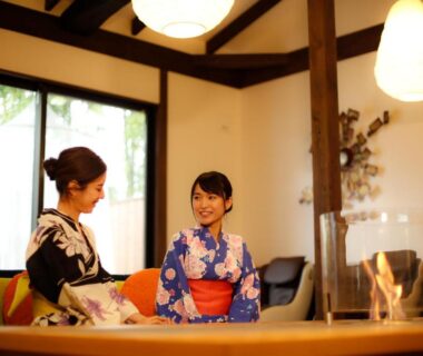 Women in yukata seated by low table in Yumenoi ryokan room, Hyōgo Kansai