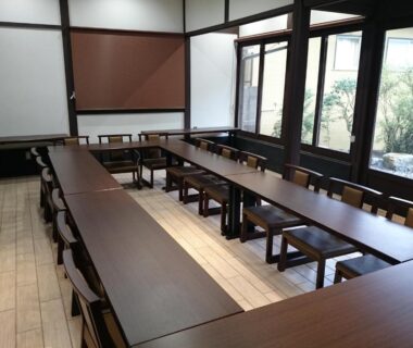 Long communal dining tables and low chairs at Yumoto Onsen OharaSansou in Kyoto, Kansai, Japan