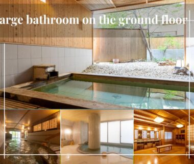 Spacious indoor baths with wooden accents and gravel courtyard view at Yumotoya ryokan, Nagano