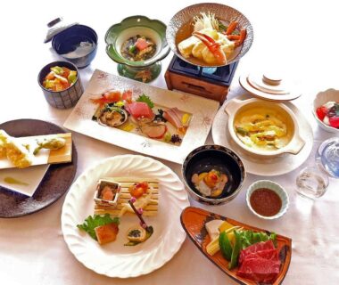 Assorted Japanese course dishes with sashimi and soup, Yunohama Hotel dining, Hokkaido, Japan