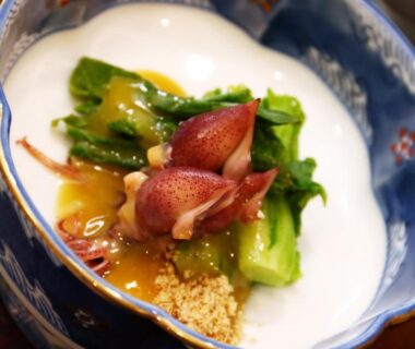 Squid and greens with creamy sauce in a blue ceramic bowl at Yunohirakan Gifu