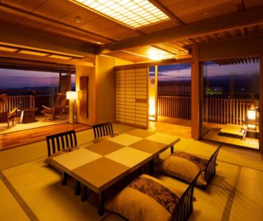 Tatami room with low table, shoji screens and balcony view at Yunokuni Tensyo, Ishikawa