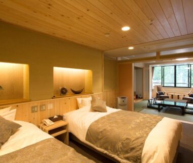 Twin beds and tatami seating with greenery view at Yura No Yado Seifuen Nagano Chūbu