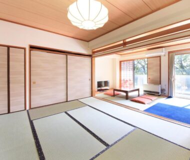 Tatami room with low table and shoji screens at Yutorelo-an ANNEX in Kanagawa, Japan