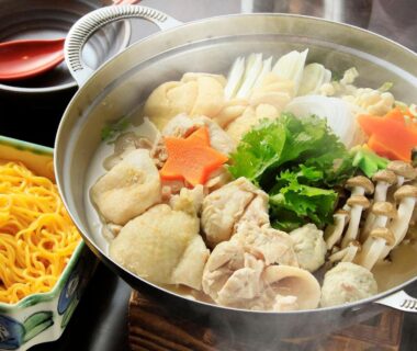 Steaming nabe hot pot with vegetables, meatballs and noodles at Yutorelo-an ANNEX Kanagawa