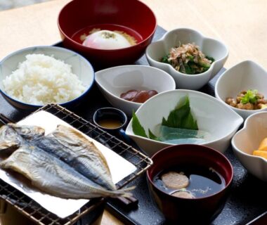 Japanese breakfast tray with grilled fish, rice, miso soup and small side dishes at Zen no Yu in Shizuoka