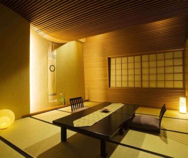 Tatami room with low table and shoji screen at kanazawayuwakuonsen nihonryourisakaeya, Ishikawa