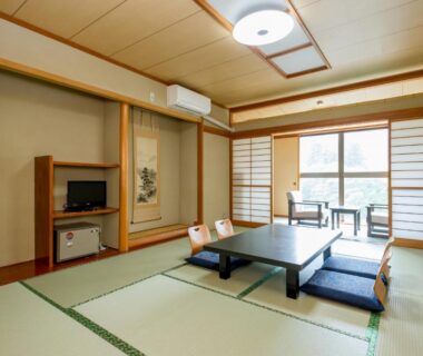 Traditional tatami room with low table and shoji, kinugawaonsen Fukumatsu, Tochigi, Japan