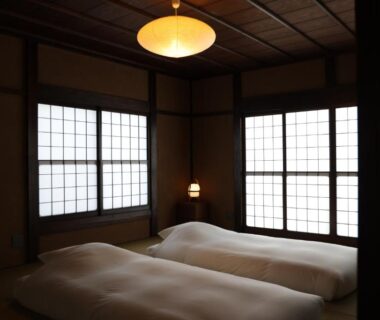 Tatami room with futon bedding and shoji screens at Kutokuan in Gifu Chubu Japan
