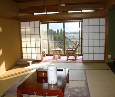 Traditional tatami room with low table, shoji screens and balcony seating at Kintoki Sanso Hakone, Kanagawa