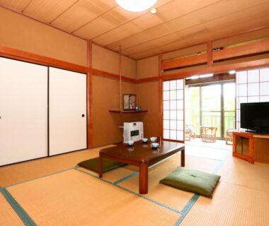 Tatami room with low table and shoji doors at Kintoki Sanso, Hakone, Kanagawa, Japan