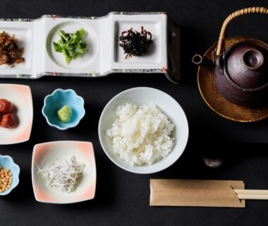 Steamed rice with assorted side dishes and teapot at Oyado Andon Toba, Mie, Japan