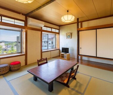 Traditional tatami room with low table and sliding fusuma at Kiyoshigekan in Gunma, Kantō