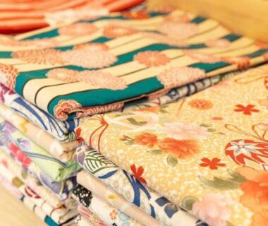 Folded patterned yukata robes prepared at Kiyoshigekan ryokan, Gunma, Kantō, Japan