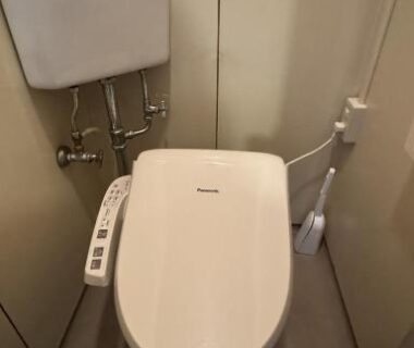 Compact washlet toilet with side control panel at Ryokan Tsuruya in Nagano Chūbu region