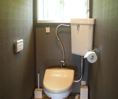Narrow western toilet with high cistern in Yasuragi no Bettei Shikitei, Yamanashi ryokan