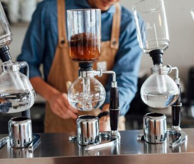 Barista brewing siphon coffee at Seaside Katsuragahama-sō in Hiroshima, Chūgoku, Japan