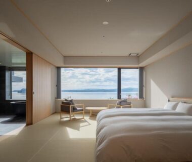 Spacious tatami room with twin beds and seaside window at 一 能登島 hitotsu notojima, Ishikawa