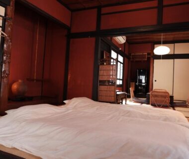 Traditional tatami room with futon bedding at Kabukiya guesthouse in Hiroshima, Chūgoku, Japan
