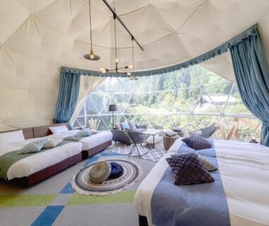 Spacious dome room with multiple beds and panoramic window at 五氣里-itsukiri- Chiba Kantō
