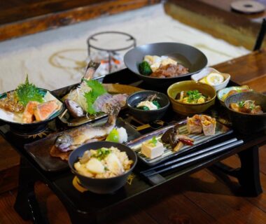 Assorted small dishes on lacquer tray at Shinshu Mahoroba ryokan in Nagano