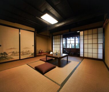 Tatami room with low table and shoji screens at 信州の古民家宿 真秀ろばmahoroba, Nagano
