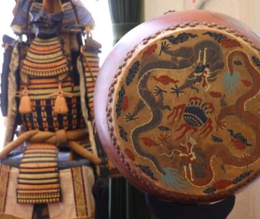 Traditional samurai armor and decorative drum in interior display at Ryokan Yama no Takohei, Hotaka Onsen, Nagano