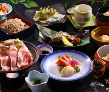 Assorted sashimi, tempura, soba and side dishes at Ryokan Yama no Takohei Hotaka Onsen Nagano