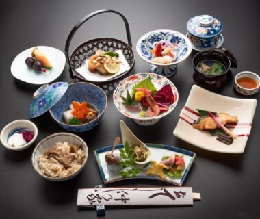 Assorted Japanese dishes and lacquerware with chopsticks set for ryokan meal at Bettei Nakanoya, Tochigi