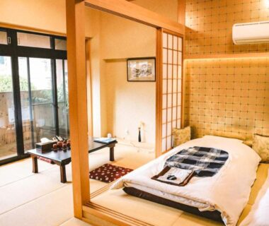 Tatami room with futon, shoji screens, low table at Waseidō Zen in Hyōgo, Kansai