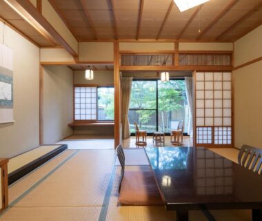 Tatami room with low table and shoji screens at Sansō Hanayu in Kumamoto, Kyūshū, Japan