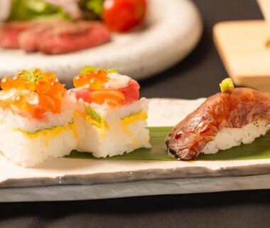 Assorted sushi on rectangular plate at Itsumu Ryokan Iwate