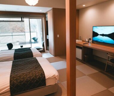 Tatami room with twin beds and window seating at Yunomori, Tochigi, Kantō, Japan