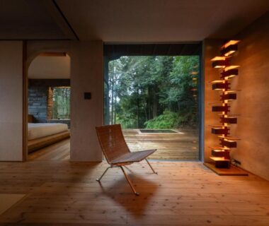 Wooden lounge with chair, shoji opening to tatami room and garden at Kaze no Mori, Oku-Takeo Onsen, Saga