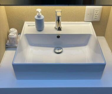 Rectangular white sink with chrome faucet and dispenser at Sawashoku auberge de Miyagawacho Kyoto