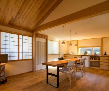 Warm wooden dining room with shoji screens and table at Shukubō Shingetsu, Saga, Kyūshū