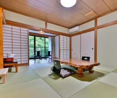 Traditional tatami room with low wooden table at Kosugian Yamakawa Onsen, Kumamoto, Kyūshū