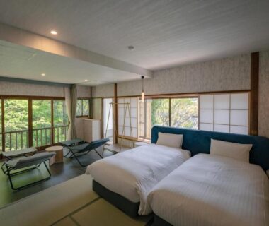 Bright tatami room with twin western beds, shoji screens and balcony view at 巛-sen-Yugawara, Kanagawa, Japan