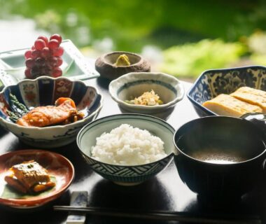 Assorted Japanese meal bowls with rice, miso soup and side dishes at Wadaya in Ishikawa, Chūbu Japan