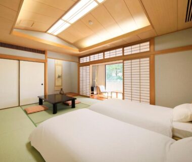Tatami room with twin beds, shoji screens and low table at La Conte Arima, Arima Onsen, Hyōgo
