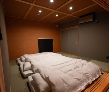 Futon bedding on tatami with wooden ceiling at Yudono Totonoyu, Yokokawa Onsen, Shizuoka