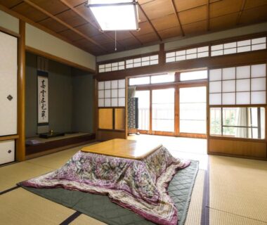 Traditional tatami room with low covered table at 清浄心院 Shojo Shin-in in Wakayama