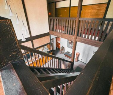 Interior wooden staircase and mezzanine at Sansō Watari in Nagano, Chūbu region