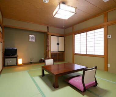 Tatami room with low table and shoji screens at Yushō Fukujikan, Gifu, Chūbu, Japan